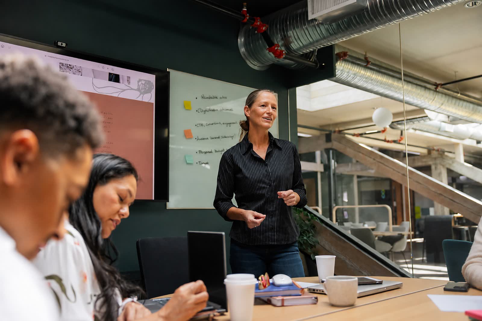 A team mapping out an AI roadmap in a working session